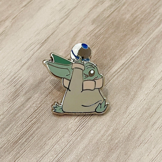 Runaway Baby Knob Enamel Pin